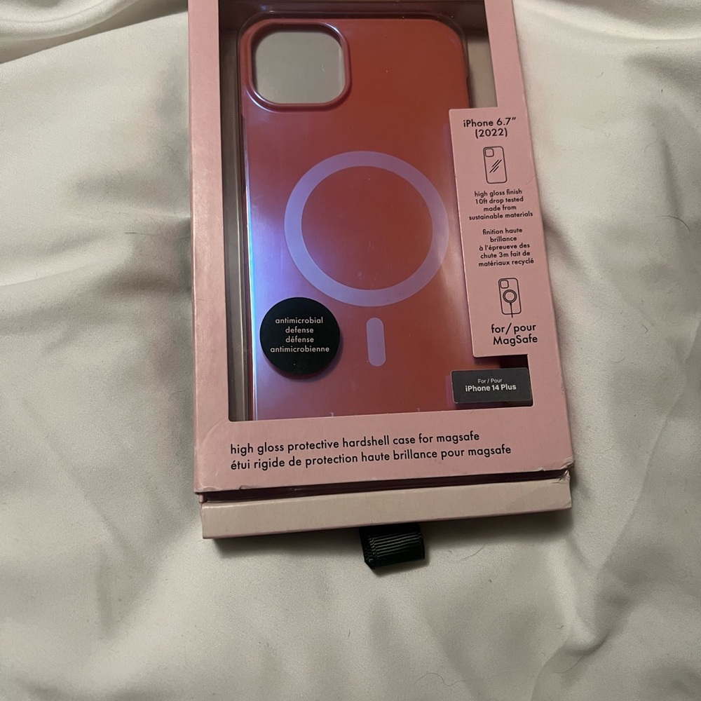 Apple Pink iPhone Case with Circular Design and Retail Packaging